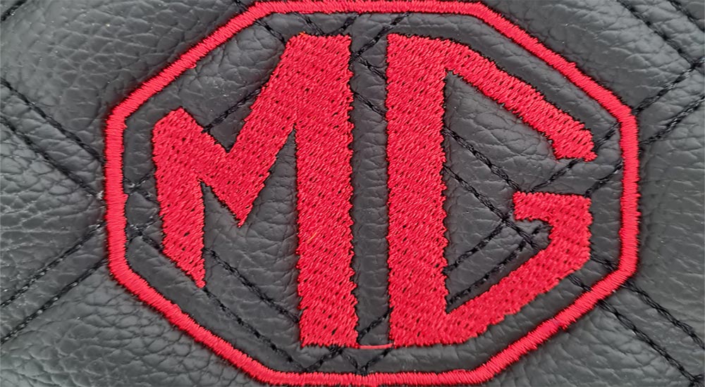 MG